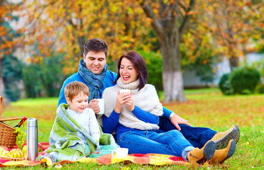 happy family together on autumn picnic