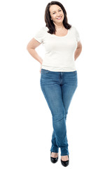 Fototapeta premium Woman holding her arms behind