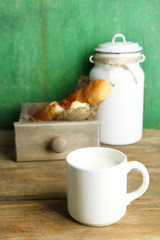 Retro still life with tasty rustic milk, on wooden table