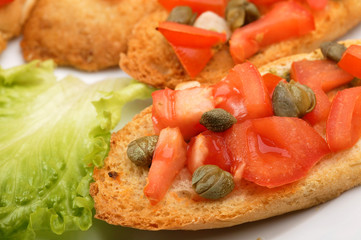 Toasts with tomatoes