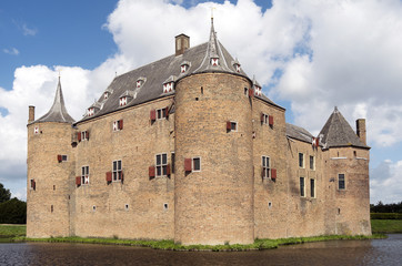 Fototapeta na wymiar Ammersoyen Castle in the village Ammerzoden in the Netherlands.
