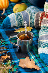 Female  feet on plaid background