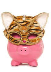 Naklejka premium piggy bank wearing tiger masquerade mask