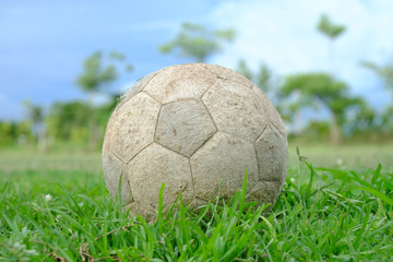 Fototapeta premium Old football on the ground