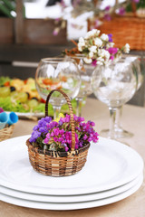 Buffet table with dishware waiting for guests