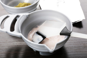 Naklejka premium Hairdresser accessories for coloring hair, close-up