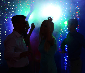 Young people dancing at party