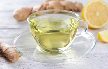 Ginger tea with lemon on table close-up