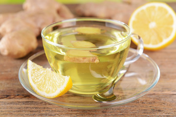 Ginger tea with lemon on table close-up
