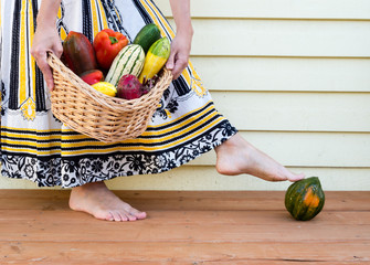 Fototapeta premium Woman with veggie basket