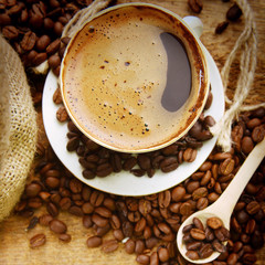 Coffee beans and cup
