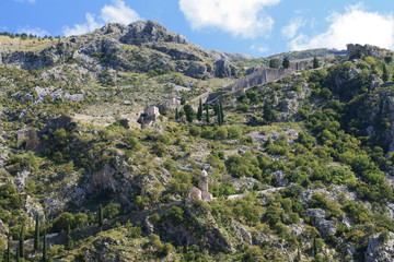 Fototapeta na wymiar The medieval fortress in the mountains. Kotor, Montenegro