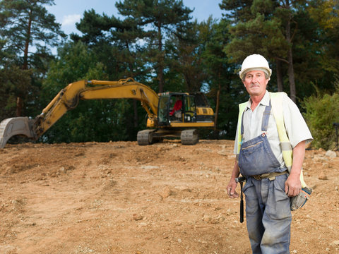 portrait of senior worker on construction site