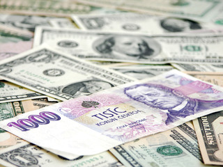 heap of dollars with Czech Krone, money background