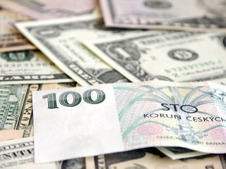 heap of dollars with Czech Krone, money background