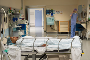 Female patient in recovery room