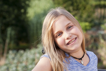 portrait of girl in the foreground with long hair