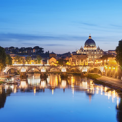 Fototapeta na wymiar River Tiber, Ponte Sant Angelo and St. Peter's Basilica