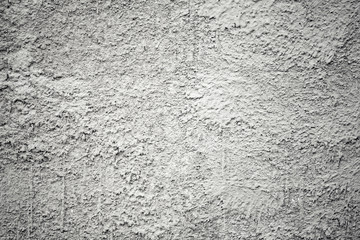 Closeup rough gray concrete wall texture with plaster