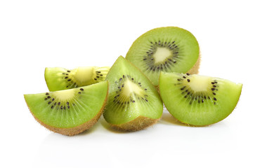 Whole kiwi fruit and his sliced segments isolated on white backg