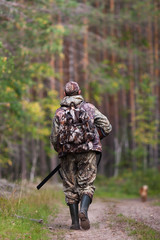 hunter walking on the road