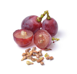 grape seeds on white background macro closeup