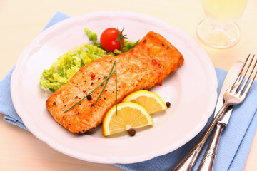 Grilled salmon, vegetables and wine