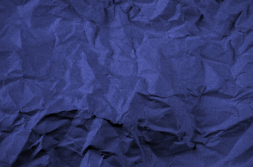 Large dark blue crushed fabric background (texture)