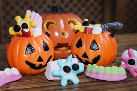 Candies and pumpkins in Halloween festivities
