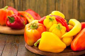 Ripe multicolored peppers on the table