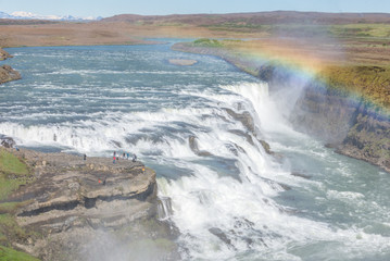 Gullfoss (Golden falls) waterfall and rainbow in Iceland..