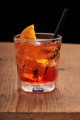Spritz aperitif, italian orange cocktail with ice cubes