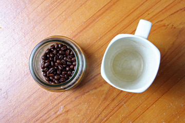 Coffee beans and cup