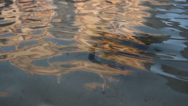 Water ripple and building reflection