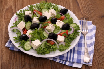 Greek farmers salad with huge black olives and sheeps cheese