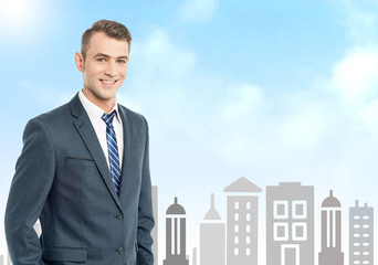 Businessman with city skyline background