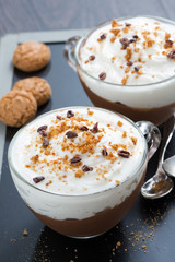 dessert with chocolate, cream and amaretti in glass cups