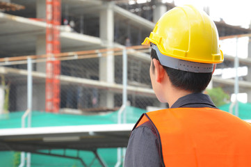 Fototapeta na wymiar Engineer or foreman checking construction site