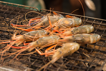 Fresh burning grilled shrimps