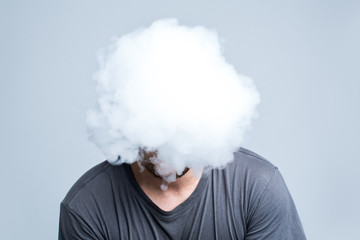 Face covered with thick smoke