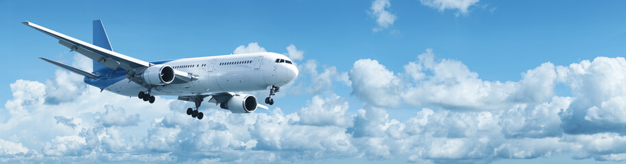 Fototapeta premium Samolot odrzutowy w błękitne niebo pochmurne