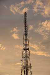 Mobile phone communication repeater antenna tower as Silhouette