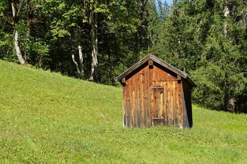 Fototapeta premium Wood house in the Alps