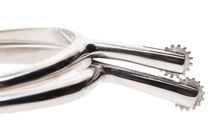 steel riding  spurs with stars  isolated. close up