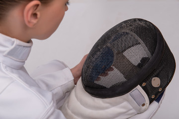Young woman engaging in fencing
