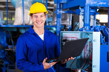 male engineer with laptop computer
