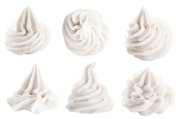 Decorative swirling toppings for dessert on white