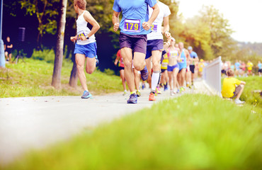Obraz na płótnie Canvas Unidentified marathon racers running
