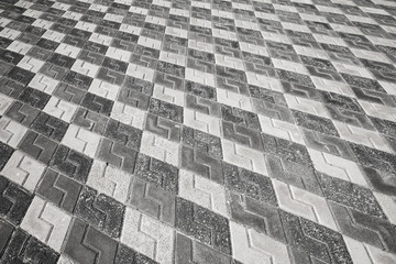 Black and white pattern of urban cobblestone pavement