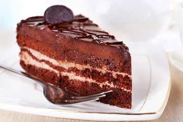 Piece of chocolate cake on plate